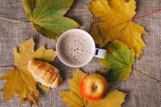 cappuccino and autumn leaves . autumn concept,flat lay