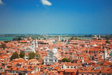 Italy, Venice. View from the St. Mark's Campanile to the red roofs of the city and the Venetian...