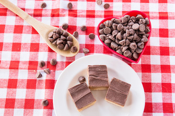 Chocolate Caramel Candy Cookies With Chips In Heart Bowl