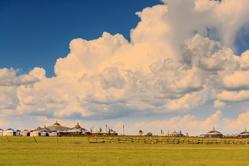 Mongolian traditional houses in immense grassland.They call these tents as ''Yurt''