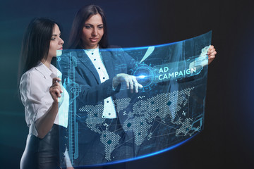 The concept of business, technology, the Internet and the network. A team of business women working on the virtual screen of the future and see the inscription: Ad campaign