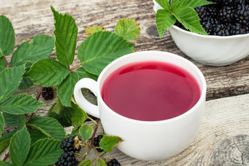 Cup of tea and blackberry