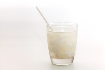 glass of coconut juice on white background