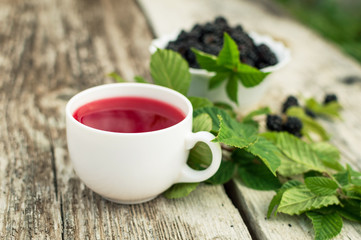 Cup of tea and blackberry