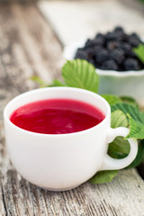 Cup of tea and blackberry
