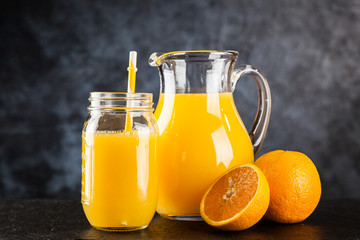 Fototapeta na wymiar Jar of orange juice