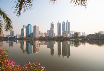 Obraz premium Beautiful modern building skyscrapers in Bangkok, Benjakiti Park, Thailand.