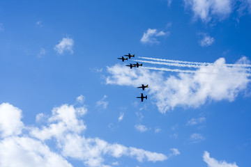 Six planes on summer sunny sky.