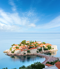 The morning view of Sveti Stefan sea islet (Montenegro) - obrazy, fototapety, plakaty