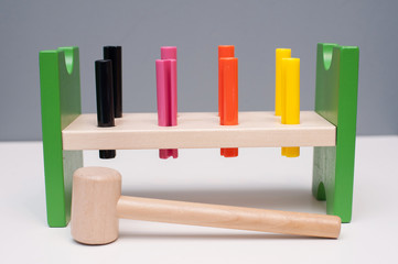 Wooden colorful kid toys on the table.