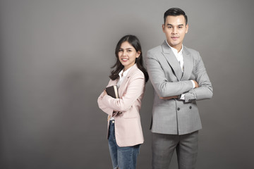 Businessman and businesswoman are smart, portrait in studio