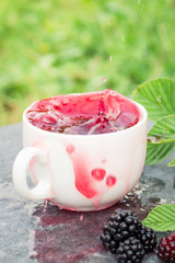 Cup of tea and blackberry