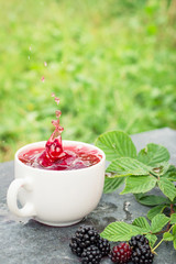 Cup of tea and blackberry