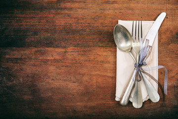 Table setting on wooden background