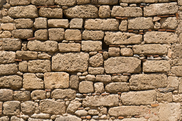 a fragment of the fortress wall jousting on the island of Rhodes in Greece