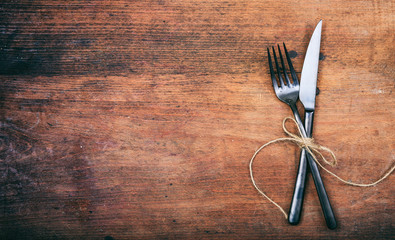 Table setting on wooden background