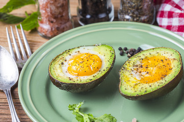 Homemade Organic Egg Baked in Avocado with Salt and Pepper