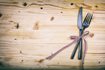 Table setting on wooden background