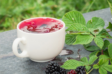 Cup of tea and blackberry