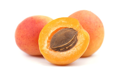Fototapeta na wymiar Isolated apricot. Fresh cut apricot fruits isolated on white background