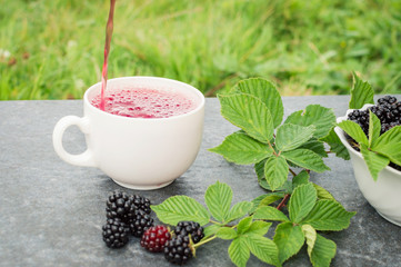 Cup of tea and blackberry
