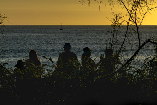 People At Beach At Sunset Time, Galapagos, Ecuador