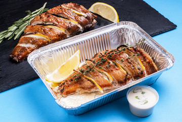 Sea bass in a thermo container