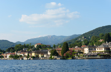 Fototapeta na wymiar Summer view on the Village of San Giullio at Lake Orta in the Piemonte region in Italy