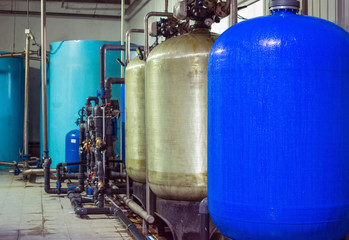 Fototapeta na wymiar Water purification filter equipment in plant workshop