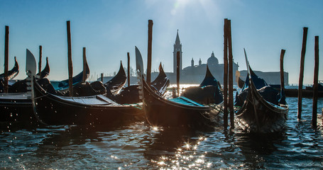 Venice, Italy. Amazing views of the Grand canal in the morning. Gondolas at the pier. © Sergej