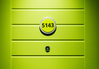 green door or room number at a cruise ship cabin 