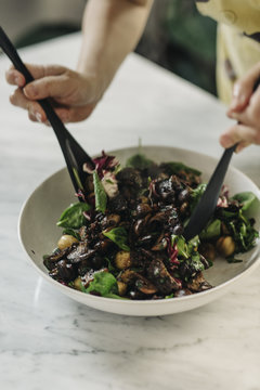 Tossing the salad