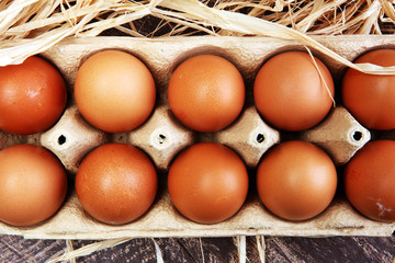 Egg. Fresh farm eggs on a wooden rustic background