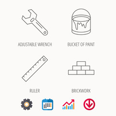 Brickwork, measurement and adjustable wrench icons.