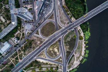 Fragment of the road junction in Kiev near the residential area of Rusanovka. Aerial view. From above