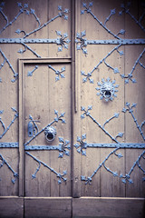 old rustic door with iron lion head