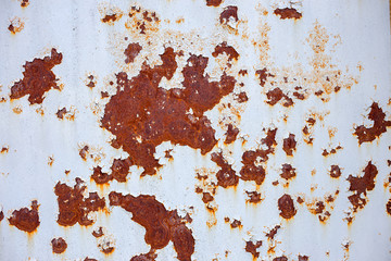 surface of rusty iron with remnants of old paint, chipped paint, texture background