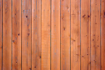 Old fence background with red boards