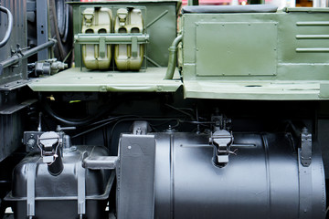 The fuel tank of a military vehicle. Background. Close-up