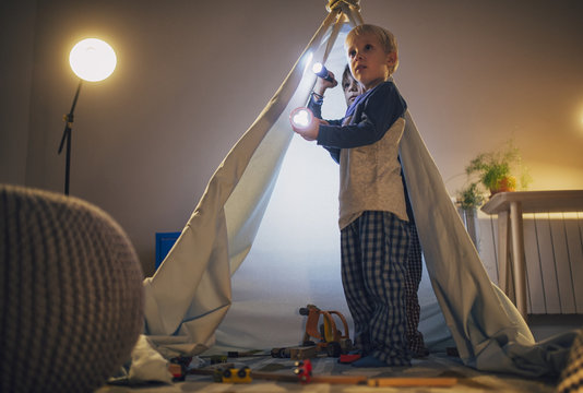 Two Boys Playing in Tent