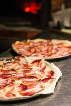 simple traditional pizza with home cured capocollo italian salam