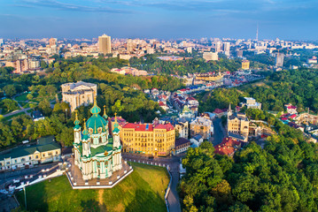 Aerial view of Saint Andrew church and Andriyivskyy Descent, cityscape of Podil. Kiev, Ukraine