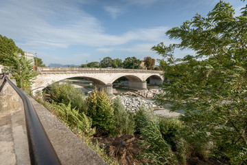 Fototapeta na wymiar Stone bridge over the Mountain river Drome in France