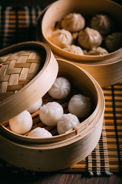 Homemade dumplings in a bamboo steamer