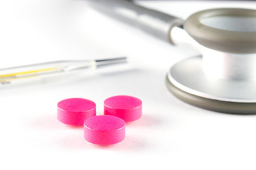 pills,stethoscope and clinical thermometer, selective focus