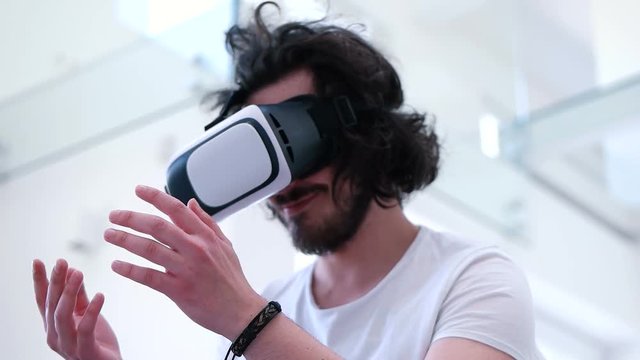 man using VR at living room