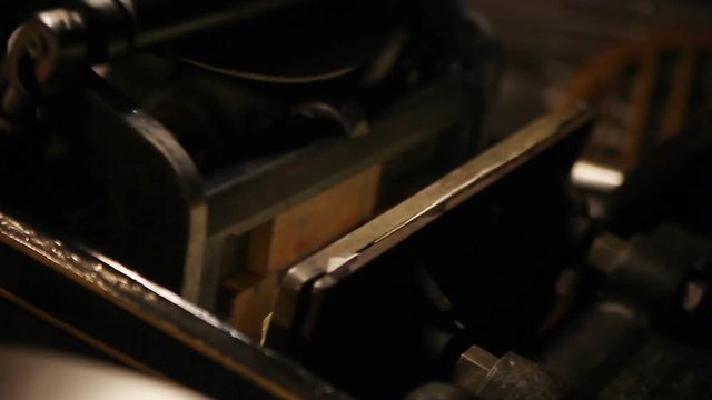 Point of view printing a card on an old press