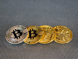 Golden and silver bitcoin on abstract background. Bitcoin cryptocurrency.