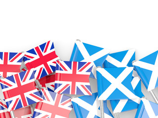 Flag pins of United Kingdom and Scotland isolated on white