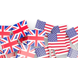 Flag pins of United Kingdom and USA isolated on white